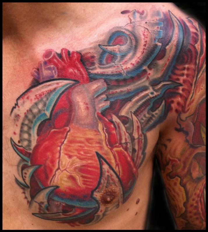 anatomical heart and bio mech tattoo by Phil Robertson Tattoos